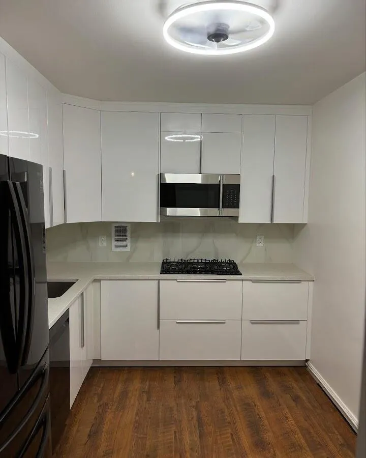 Renovated kitchen with quartz countertops in Dennis