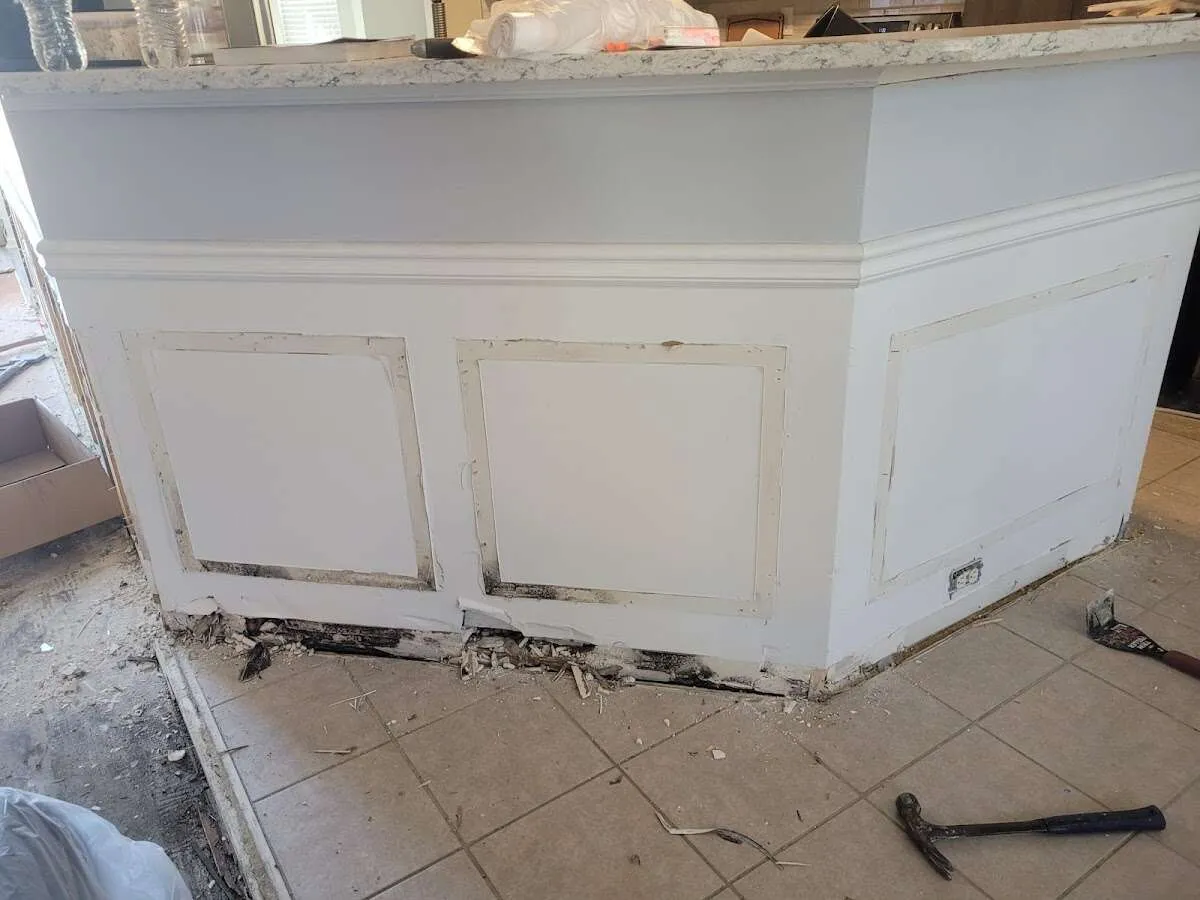 Water damage and mold on kitchen during Storm Damage Restoration in Dennis